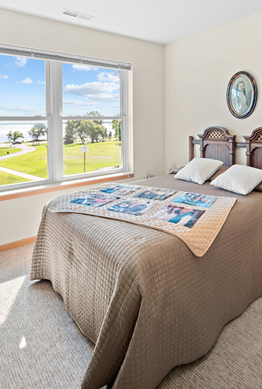 Assisted living apartment bedroom at Good Samaritan Society - Battle Lake