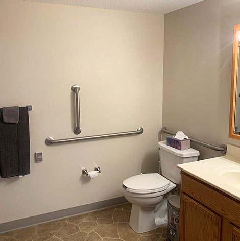 Senior living apartment bathroom at Good Samaritan Society - Hidewood Estates in Clear Lake, South Dakota.