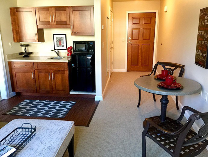 Good Samaritan Society - Fairfield Glade Assisted Living apartment with open concept living room.