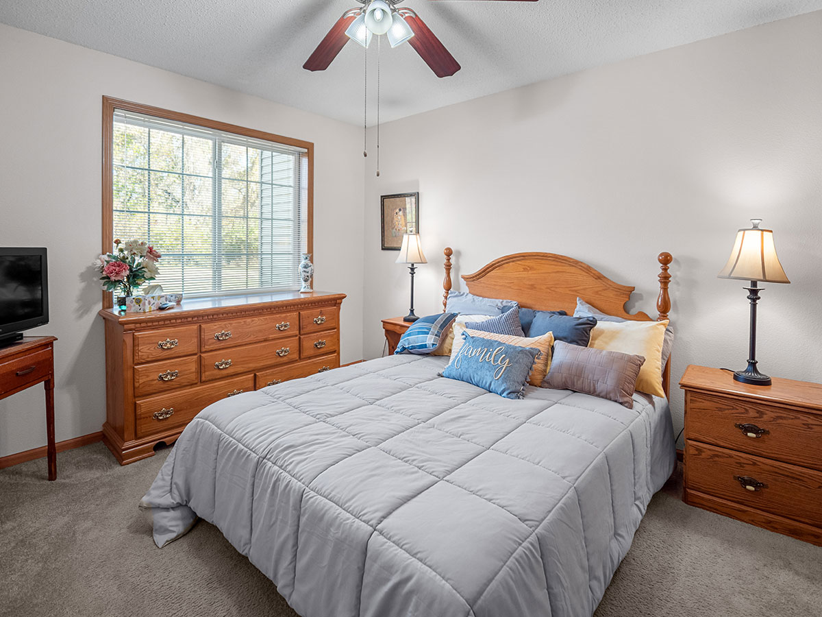 Spacious master bedroom with large closet available in Heritage Court independent living apartments at Good Samaritan Society - Davenport in Davenport, Iowa.