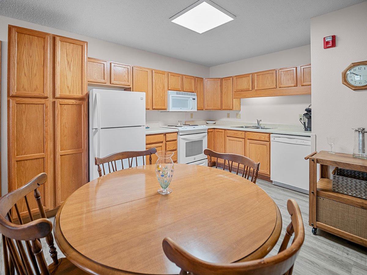 Cozy kitchen with appliances available in Heritage Court independent living apartments at Good Samaritan Society - Davenport in Davenport, Iowa.