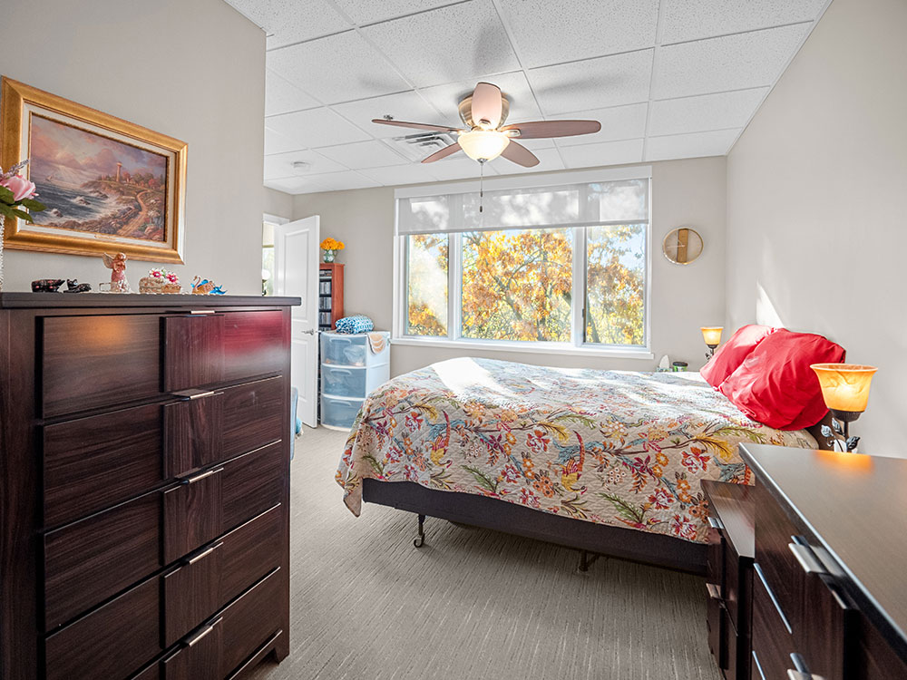 Spacious master bedroom available in Schuetzen Park independent living apartments at Good Samaritan Society - Davenport in Davenport, Iowa.