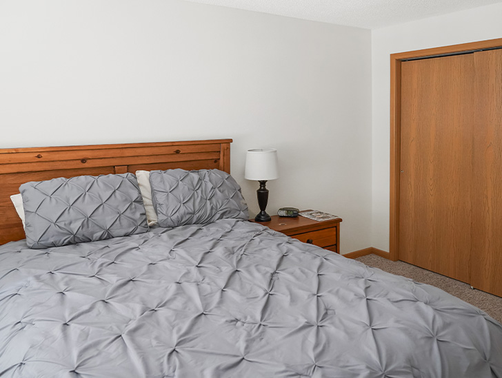 Large bedroom for respite care residents at Good Samaritan Society - Heritage Grove in East Grand Forks, Minnesota.