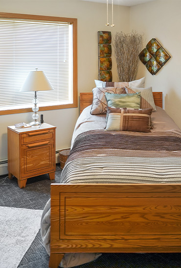 Bedroom in the Oaks building at Good Samaritan Society - Heritage Grove in East Grand Forks, MN