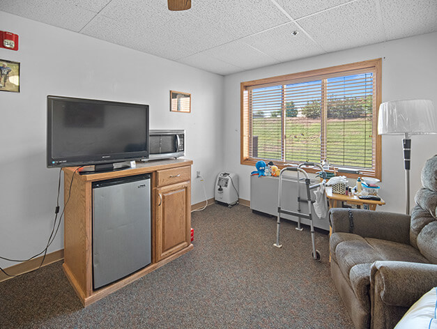 Assisted living apartment living room at Good Samaritan Society - Ellis