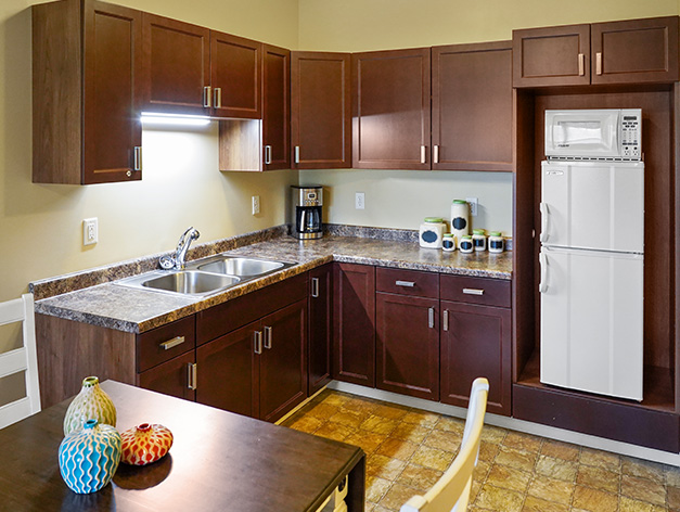 Assisted living apartments feature a kitchenette at Good Samaritan Society - International Falls in International Falls, Minnesota.
