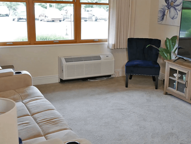 Good Samaritan Society - Mountain Home independent living apartment living room with large window