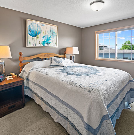 Spacious senior living apartment bedroom in Ridge View Estates at Good Samaritan Society - Pipestone in Pipestone, Minnesota.