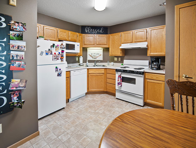 Senior living residents enjoy a large kitchens in Ridge View Estates at Good Samaritan Society - Pipestone in Pipestone, Minnesota.  