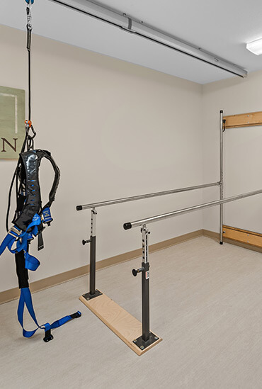 Rehab room with parallel bars at Good Samaritan Society - Waukon.