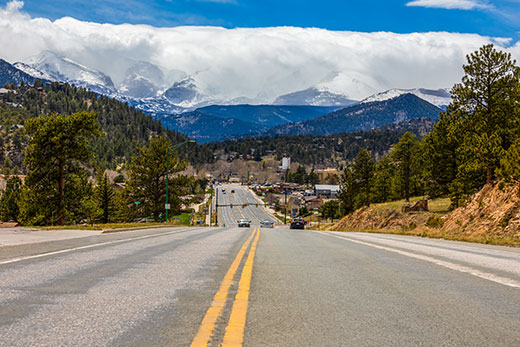 Why choose the Good Samaritan Society? Road in Colorado with mountains in the background