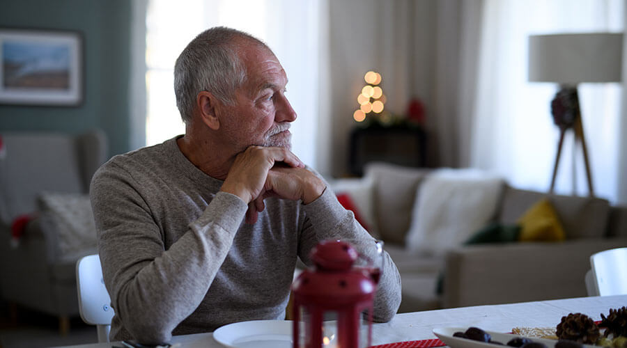 Man experiencing the holiday blues