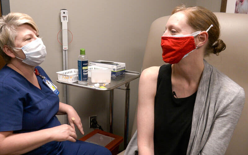 New mom and Society senior pastor gets COVID-19 vaccine