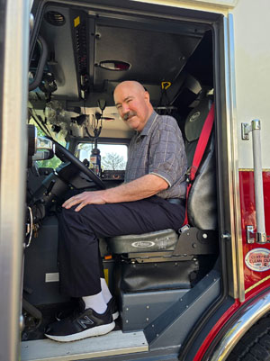 Steve Moody in a firetruck.